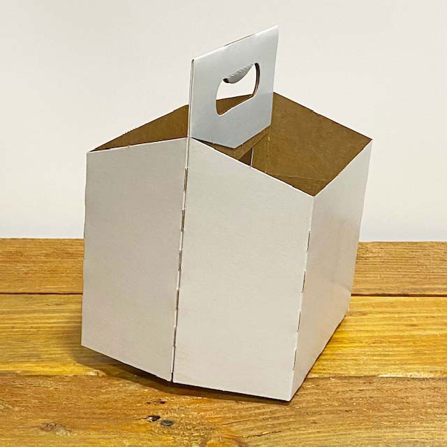 https://www.thebeveragepeople.com/media/images/4-Pack-Cardboar-Carrier-Empty.jpg