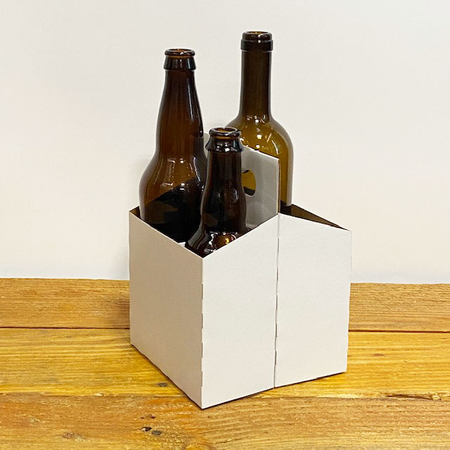 https://www.thebeveragepeople.com/media/images/4-Pack-Cardboar-Carrier-with-Bottles.jpg