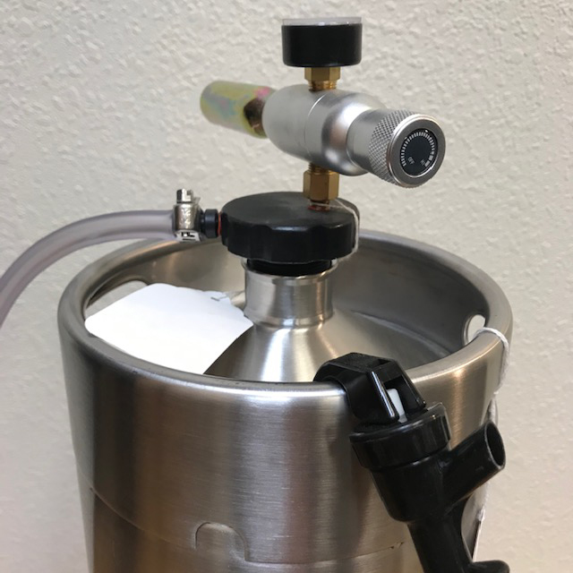 https://www.thebeveragepeople.com/media/images/Mini-Keg-Dispenser-with-hose.jpg